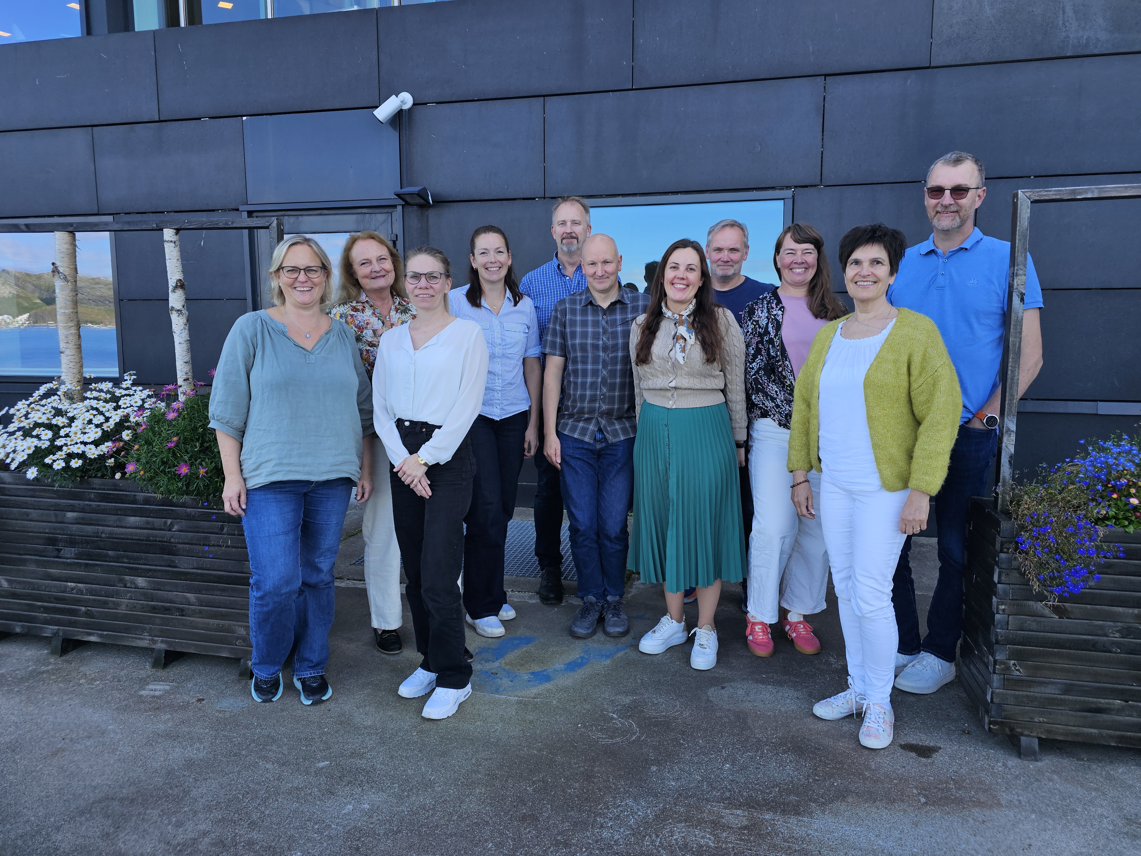 Gruppe av mennesker stående