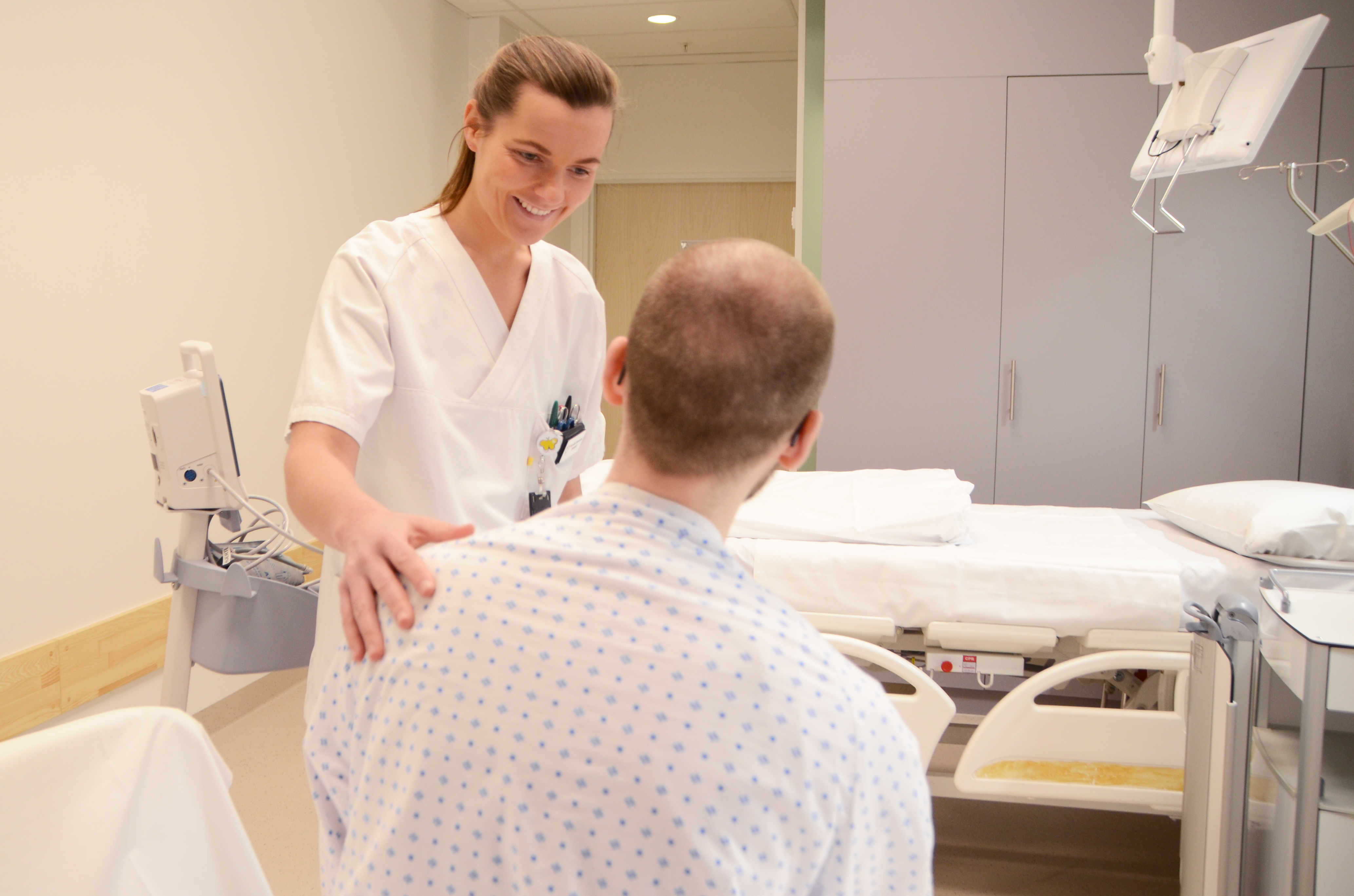 Sykepleier og pasient