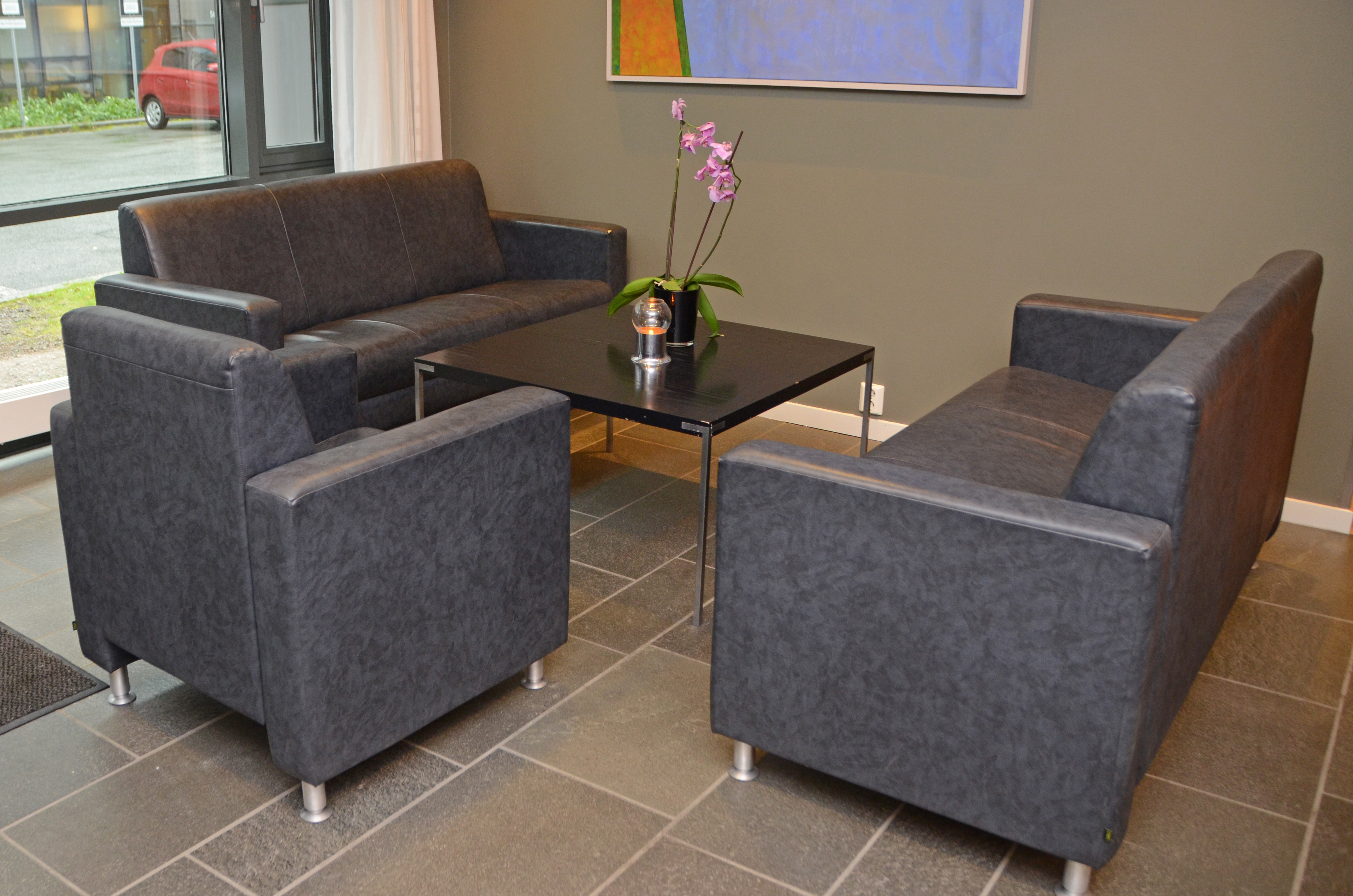 Seksjon med godstoler og bord